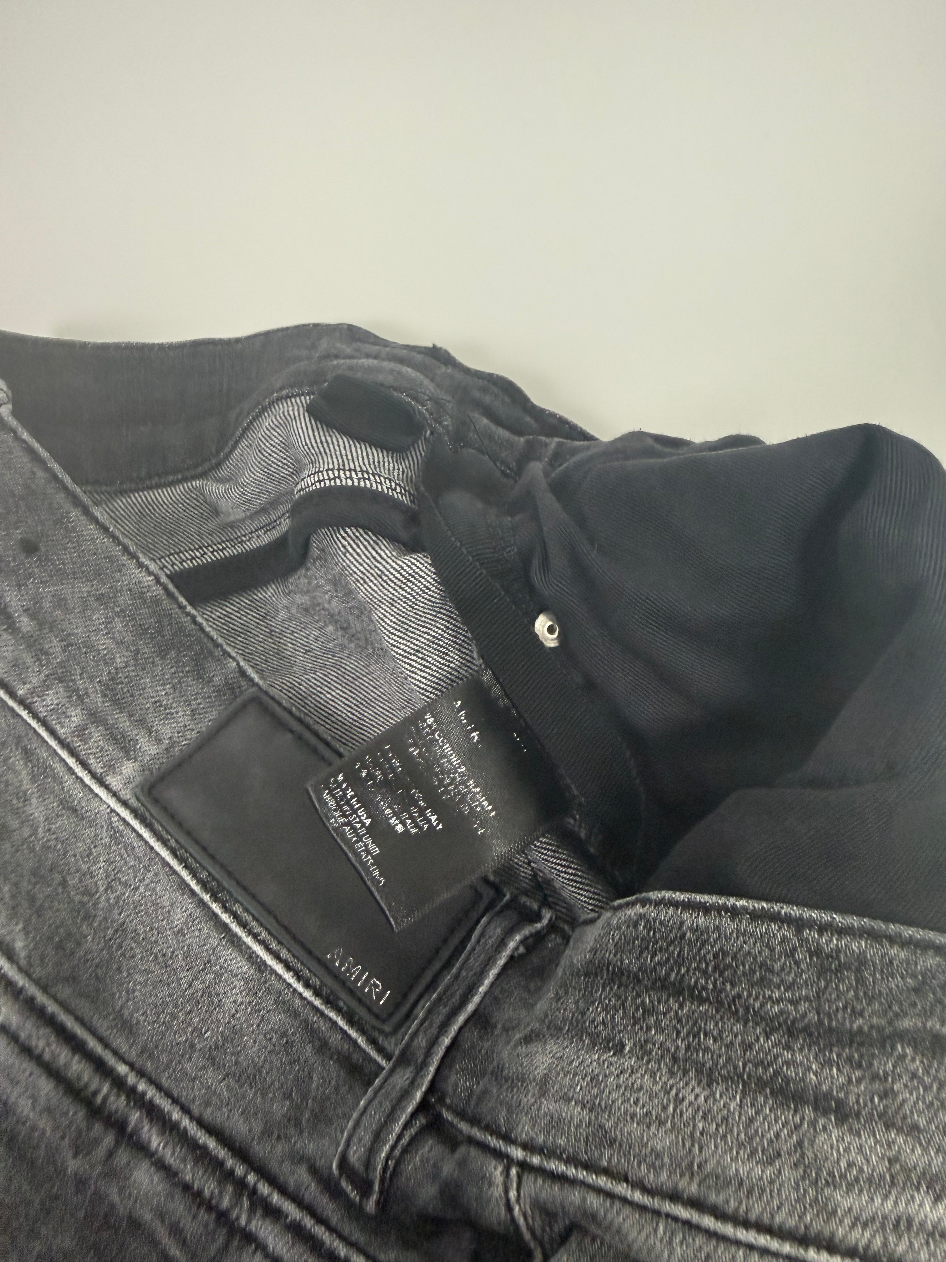 Amiri Ripped Grey Jeans