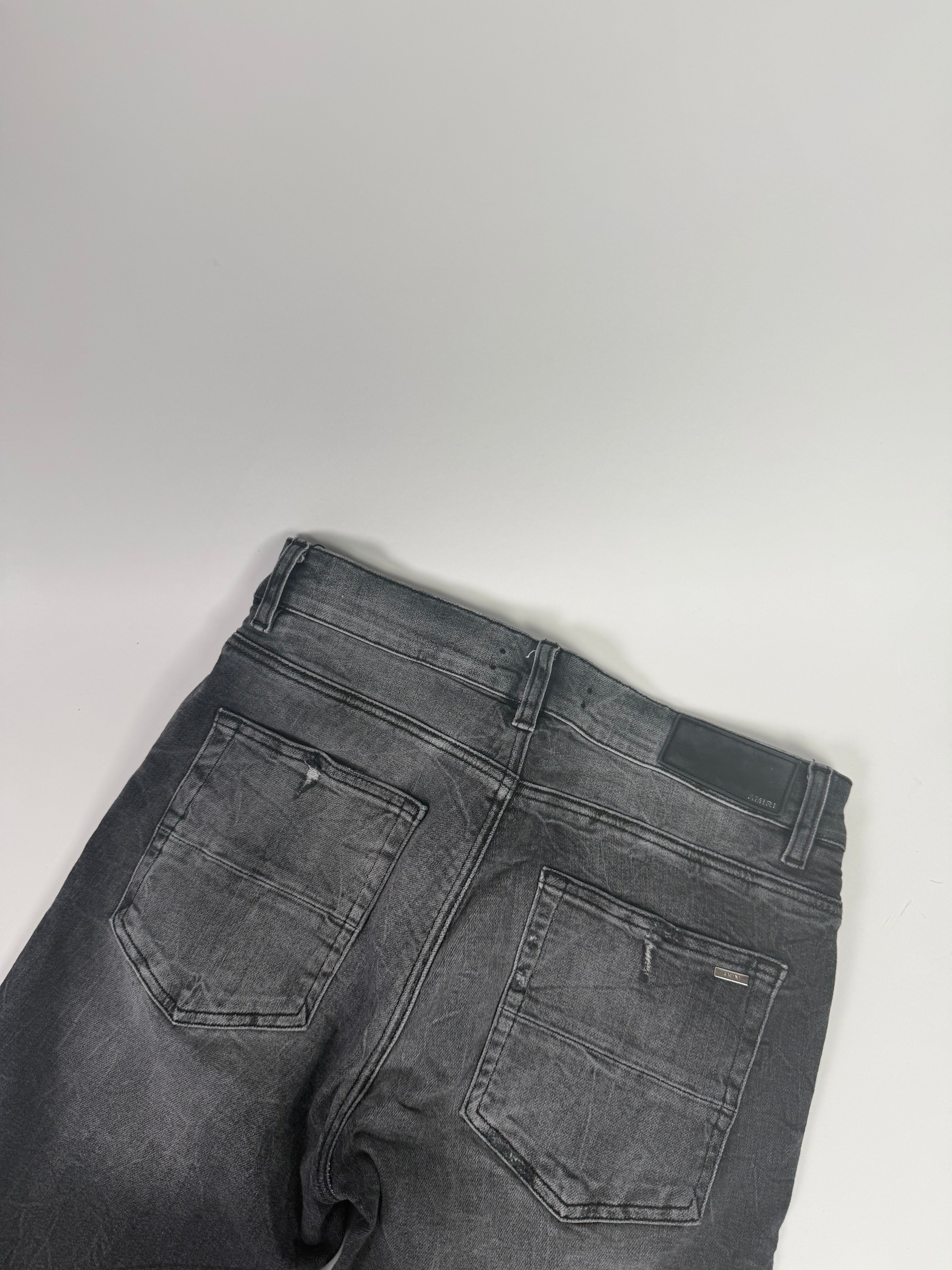 Amiri Ripped Grey Jeans