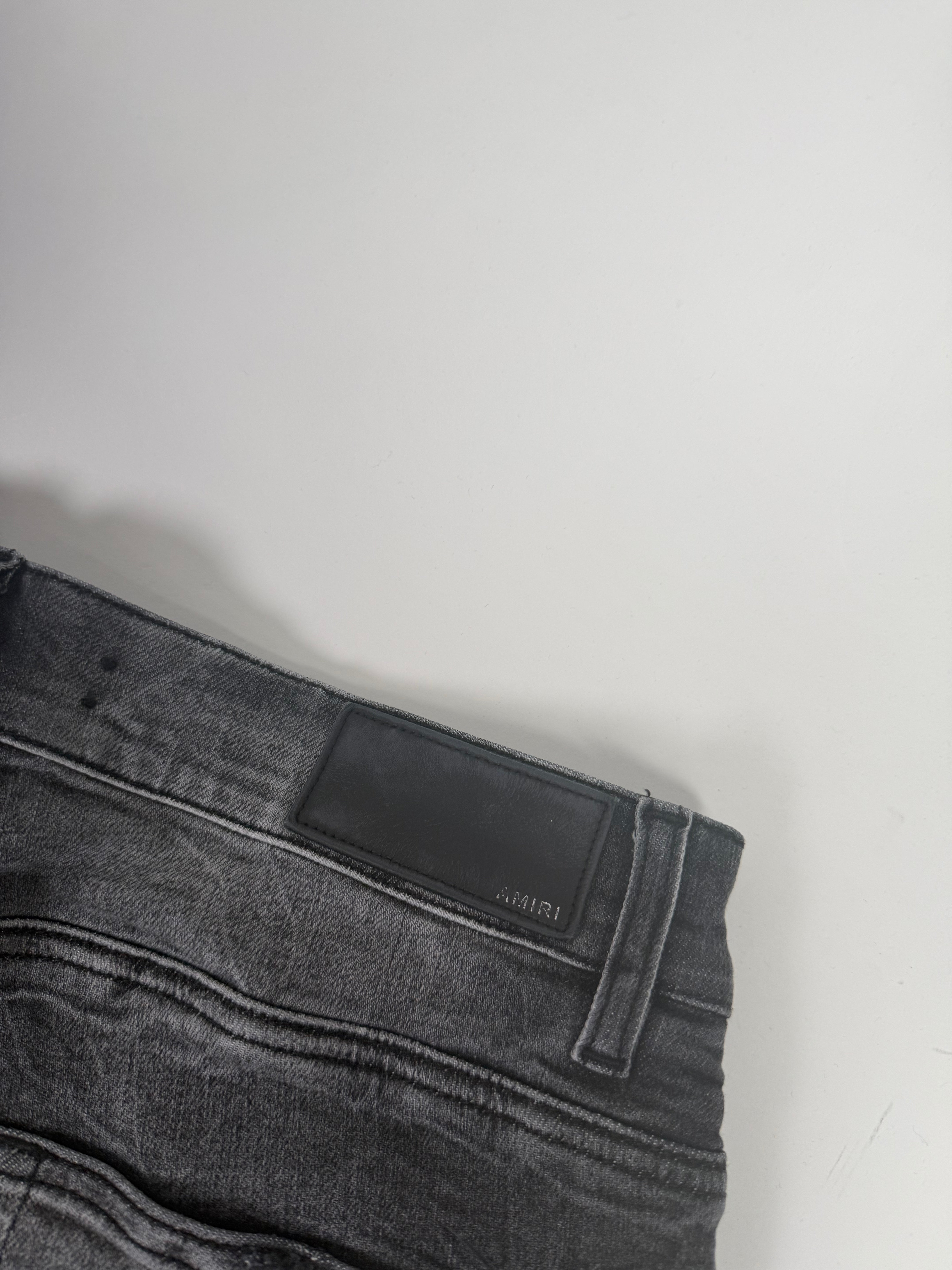 Amiri Ripped Grey Jeans