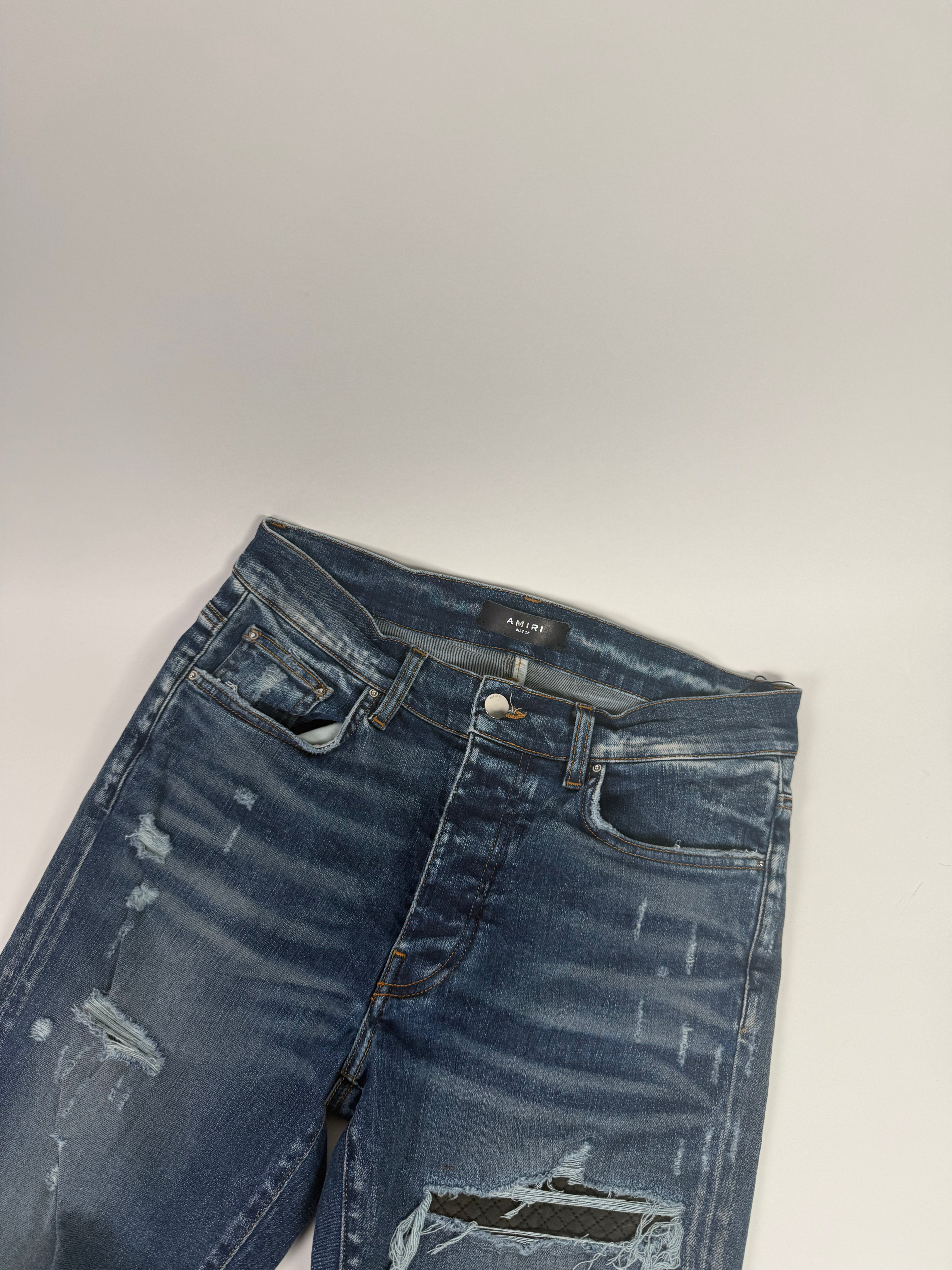 Amiri Ripped Blue Jeans