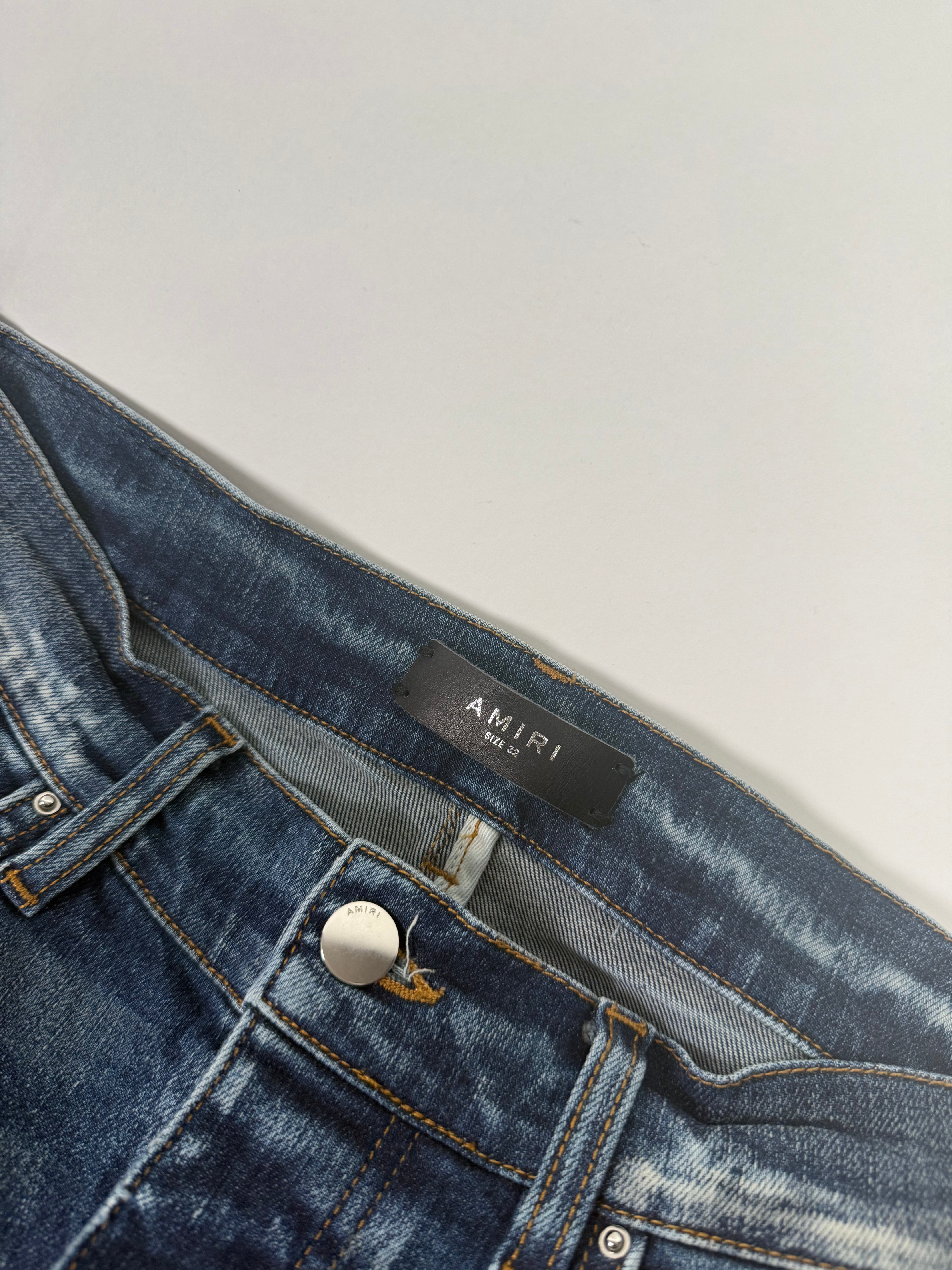 Amiri Ripped Blue Jeans