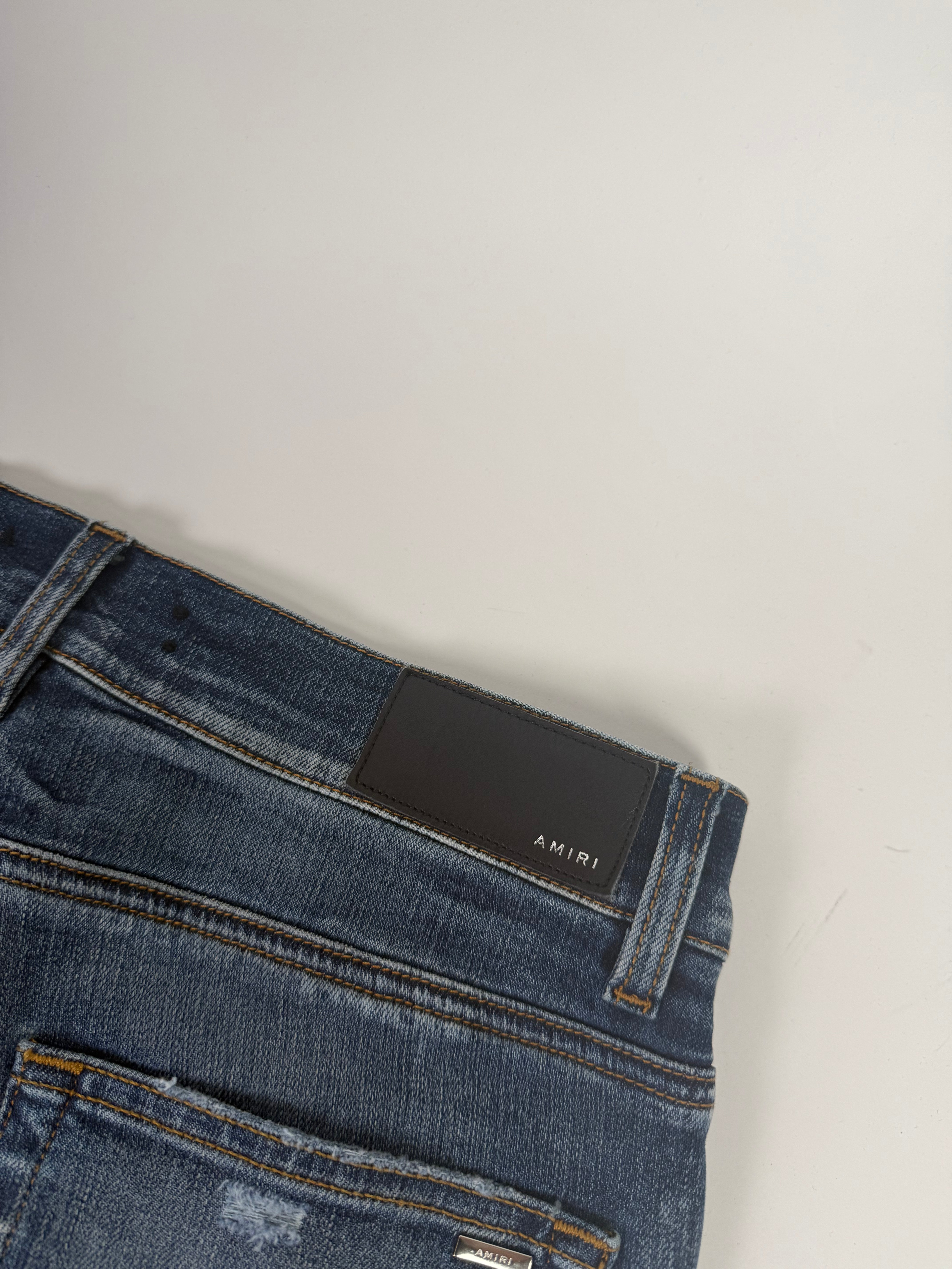 Amiri Ripped Blue Jeans