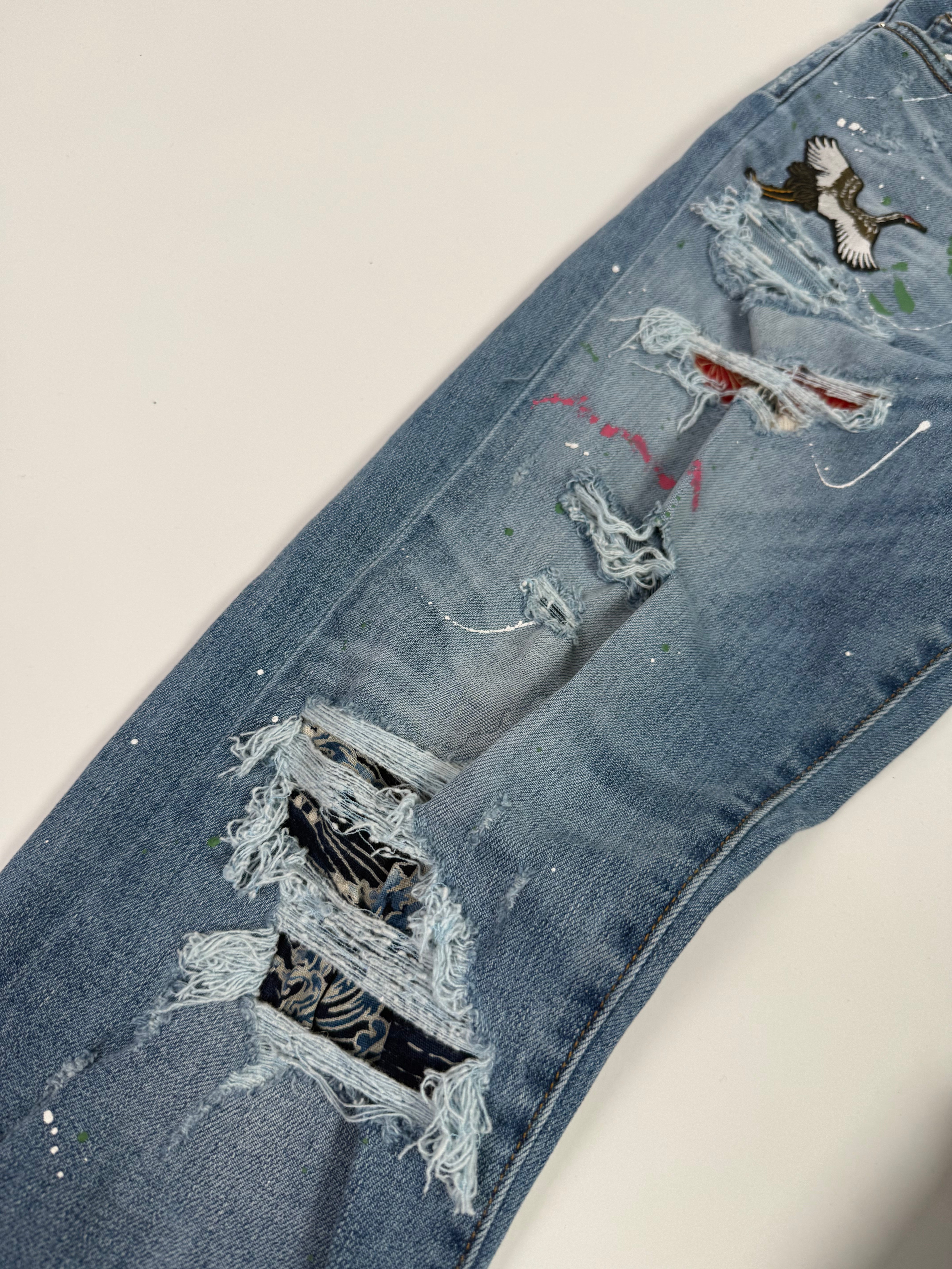 Amiri Ripped Blue Jeans