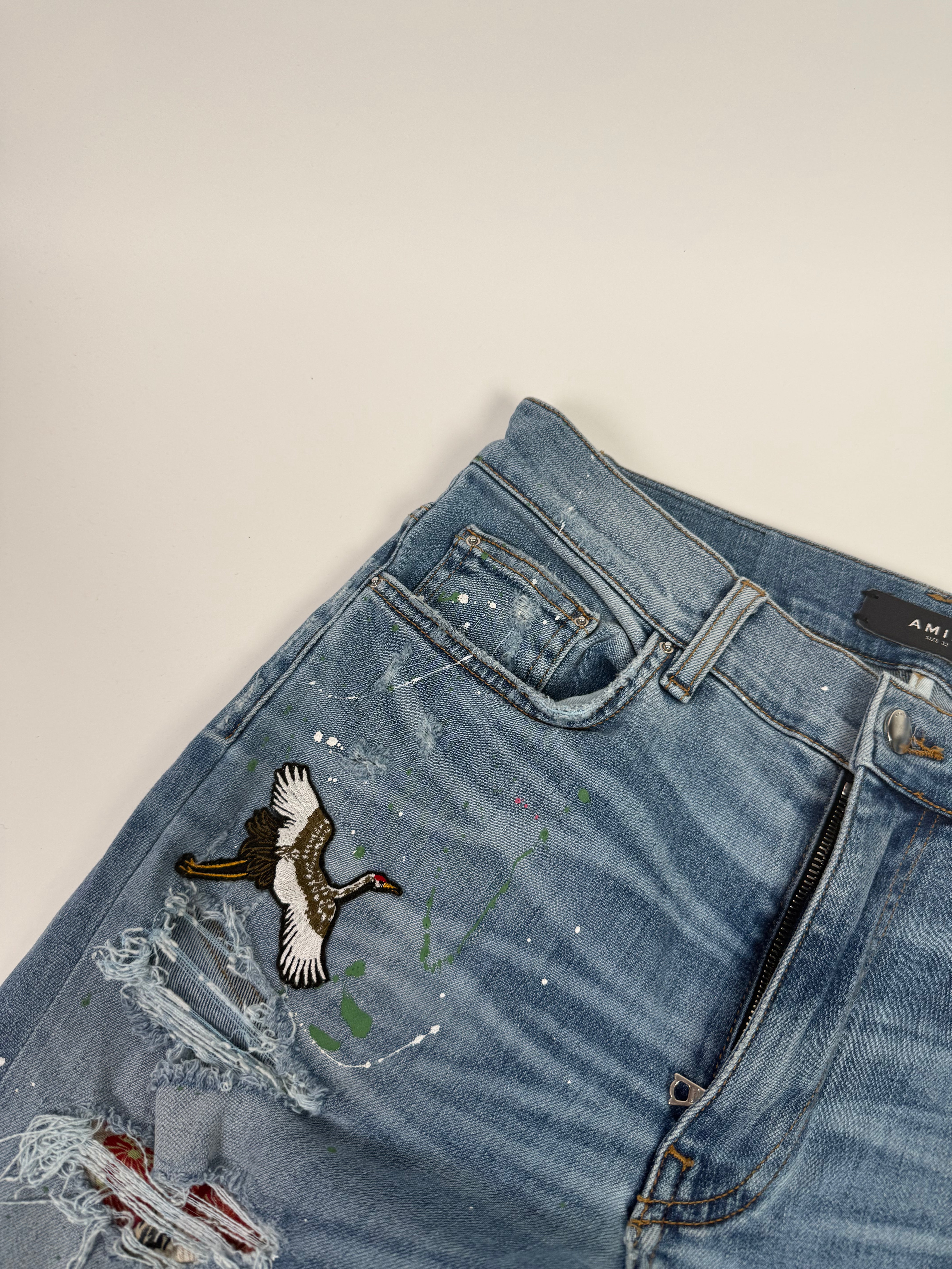 Amiri Ripped Blue Jeans