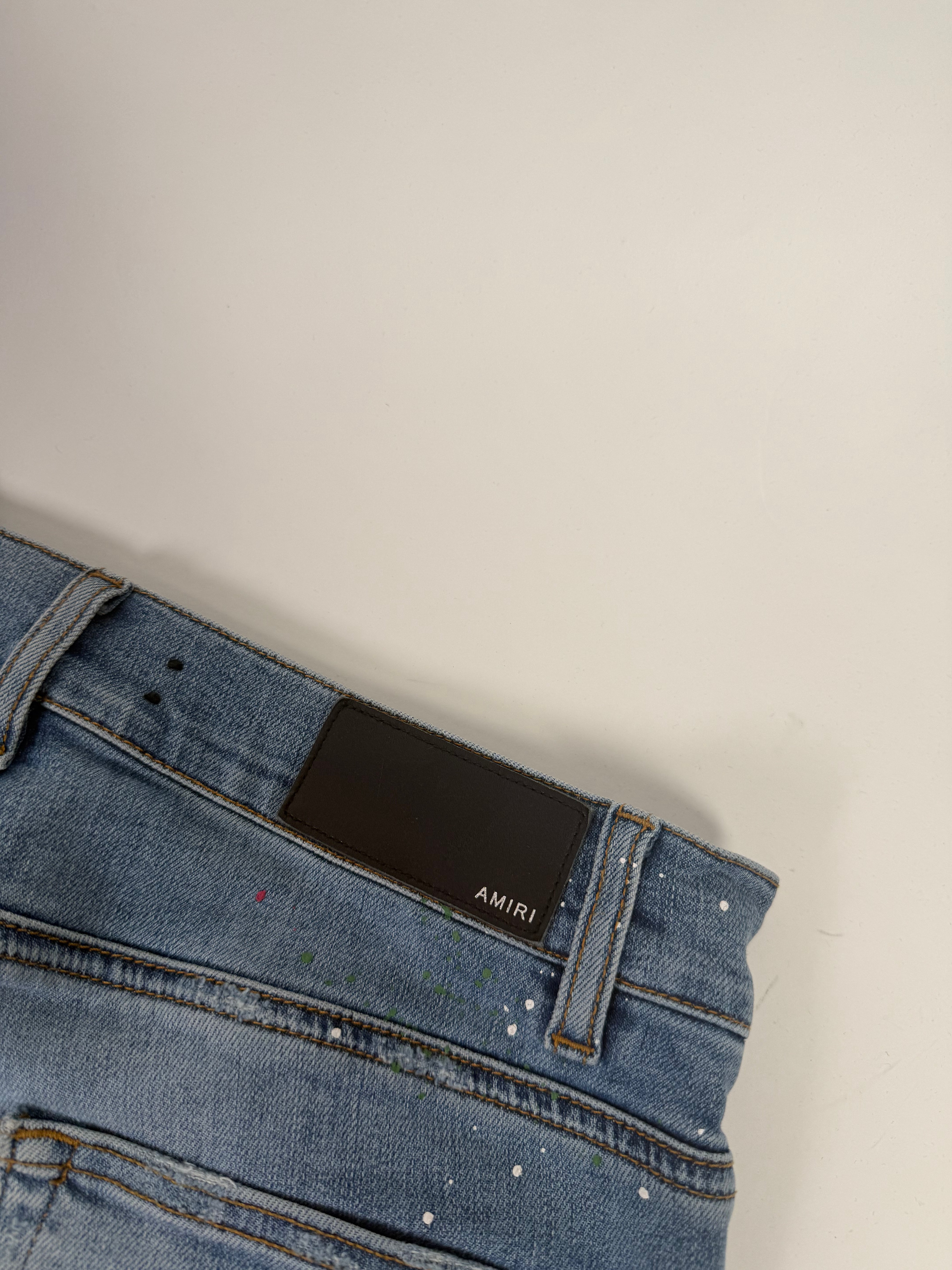 Amiri Ripped Blue Jeans