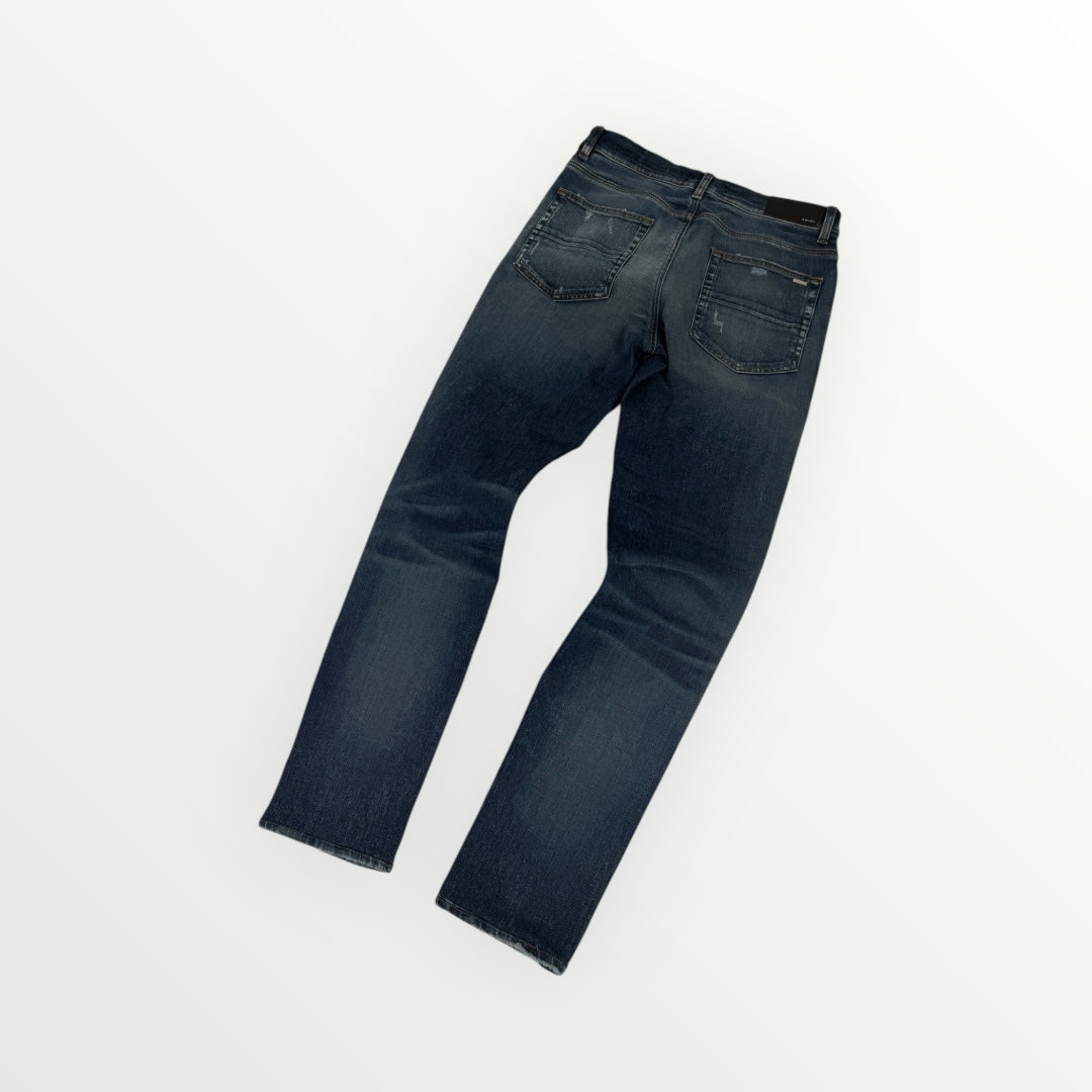 Amiri Ripped Blue Jeans
